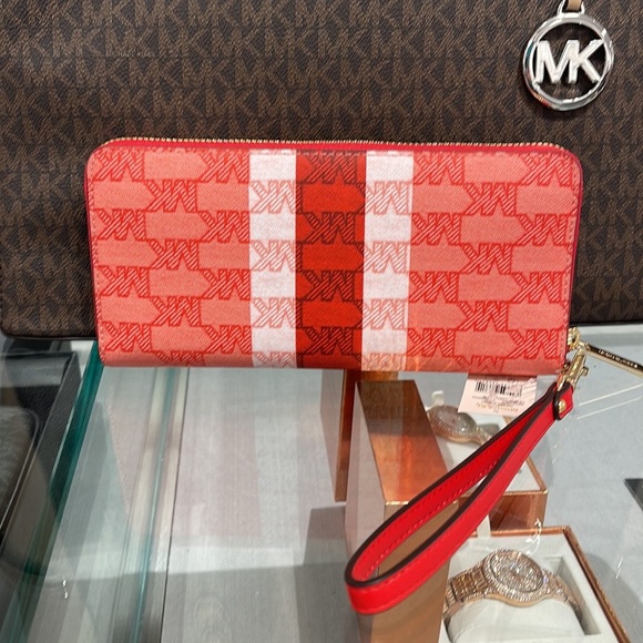 MICHAEL KORS Leather Continental Phone Holder Wristlet Wallet 
Dark Sungria
NWT